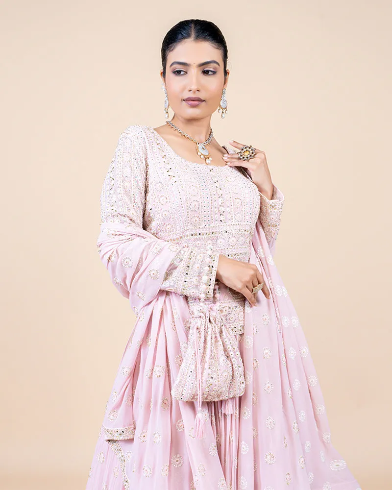 Pink Sharara Set with Zari Buti Embellishments and Tassels on Dupatta